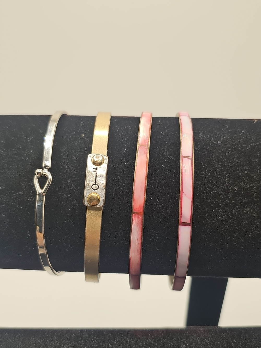 Lot Of 4 Braclets. 2 Pink Inlay, 1 Silver Tone(think Positive) 1 Brass( Key)